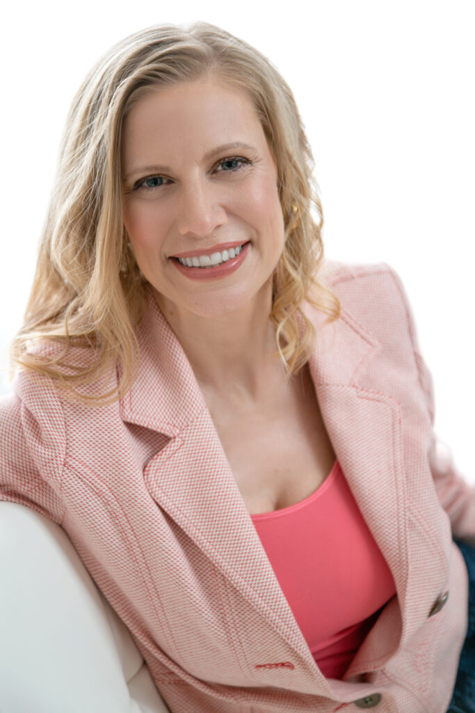 Photo of Danielle Isaac, smiling warmly at the camera