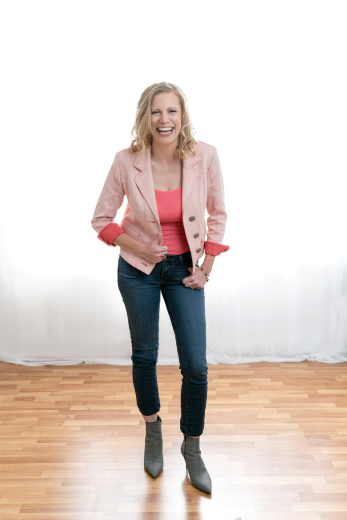 Photo of Danielle Isaac, standing and laughing